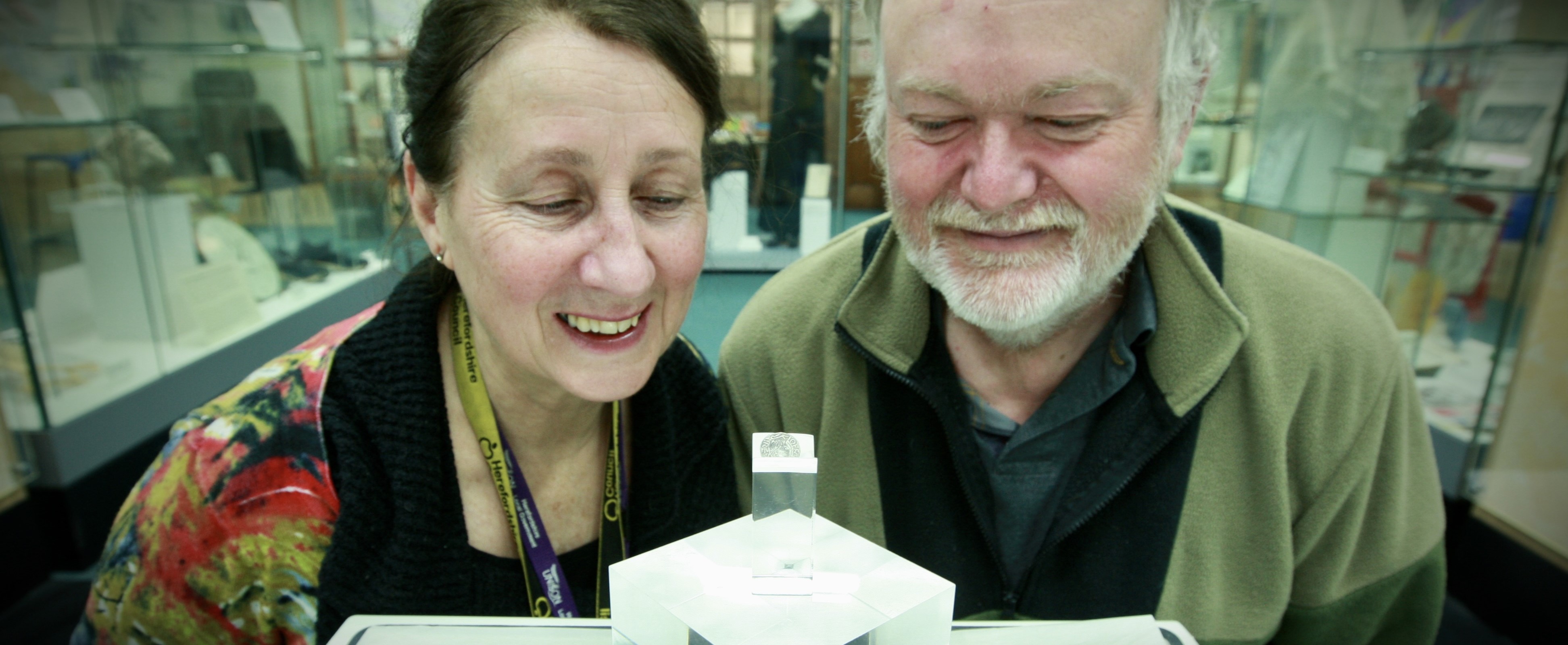 Judy Stevenson and Dr Jerry Davis are pleased to see the ancient penny in place in Hereford Museum