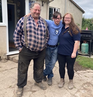Simone and Maurice with Paul standing outside a rural property
