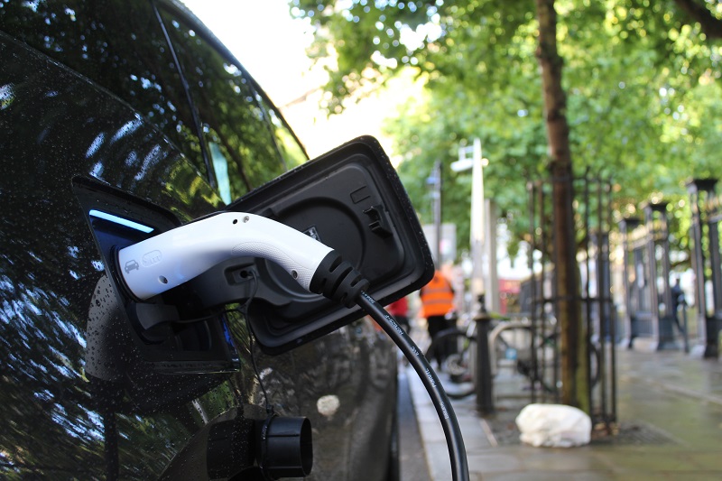 Electric vehicle charging - Photo by Andrew Roberts on Unsplash