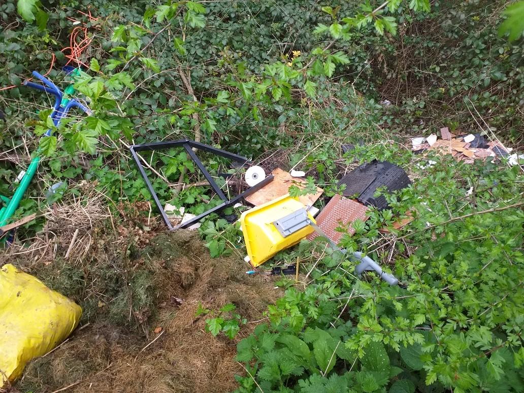 Rubbish fly-tipped in Herefordshire countryside